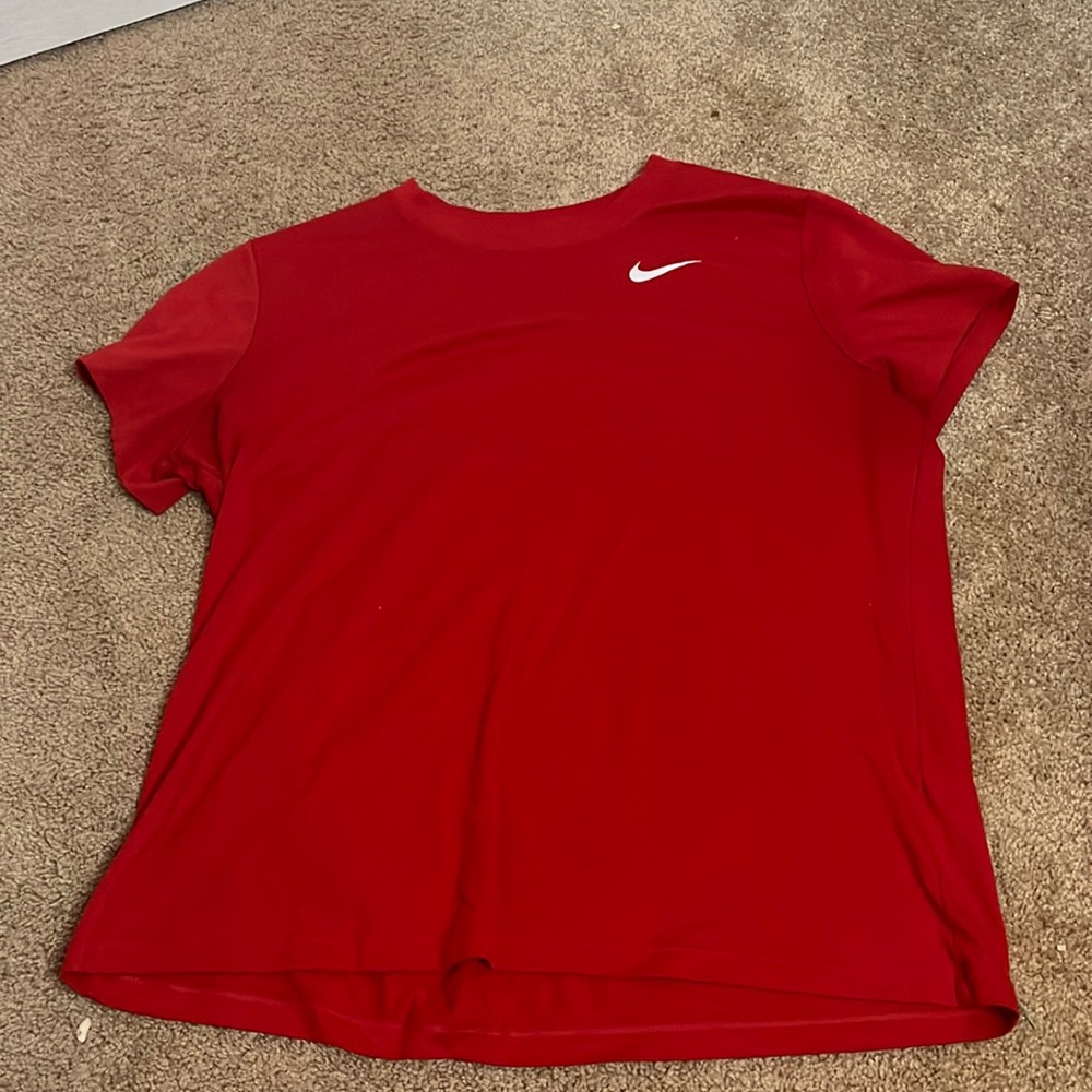 Red Nike athletic shirt